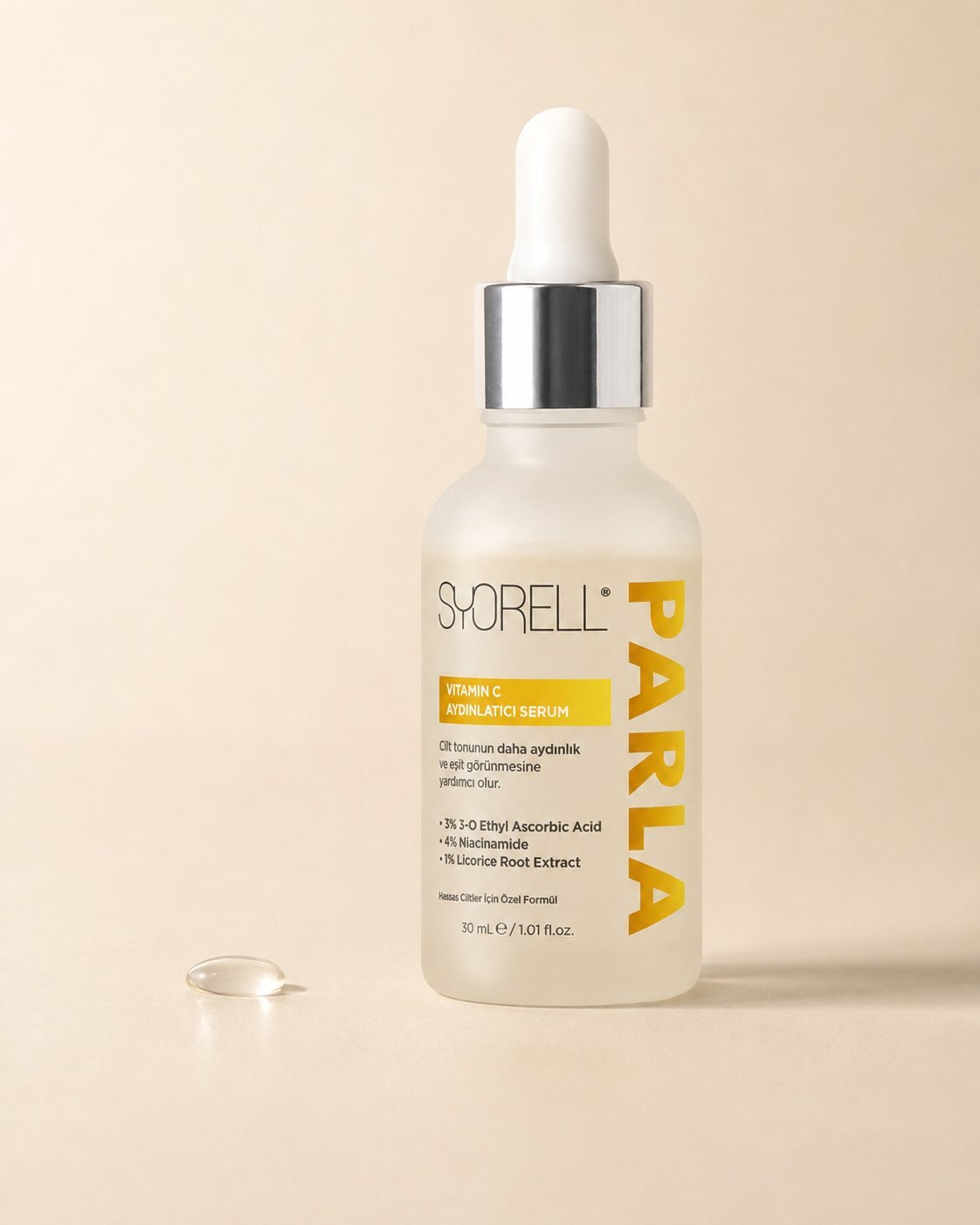 Syorell Parla Vitamin C Brightening Serum on cream backdrop with single serum droplet